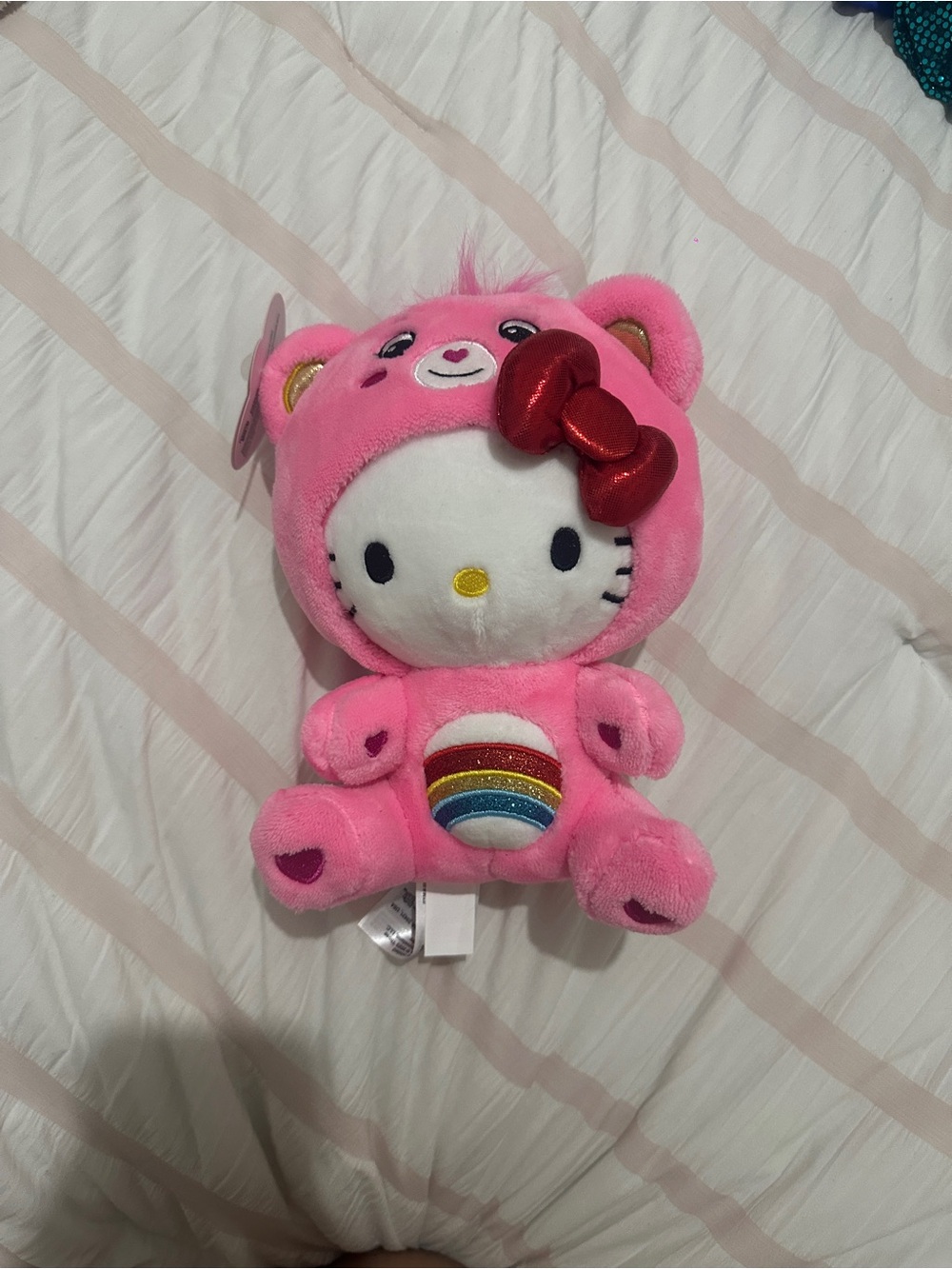 Sanrio Hello Kitty Pink Plush with Rainbow Belly and Red Bow